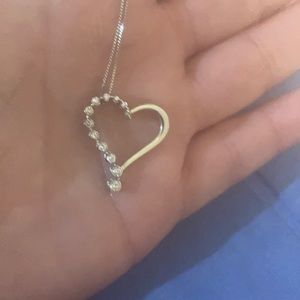 Lovely 14k white gold and diamond heart pendant with authentic diamonds!!